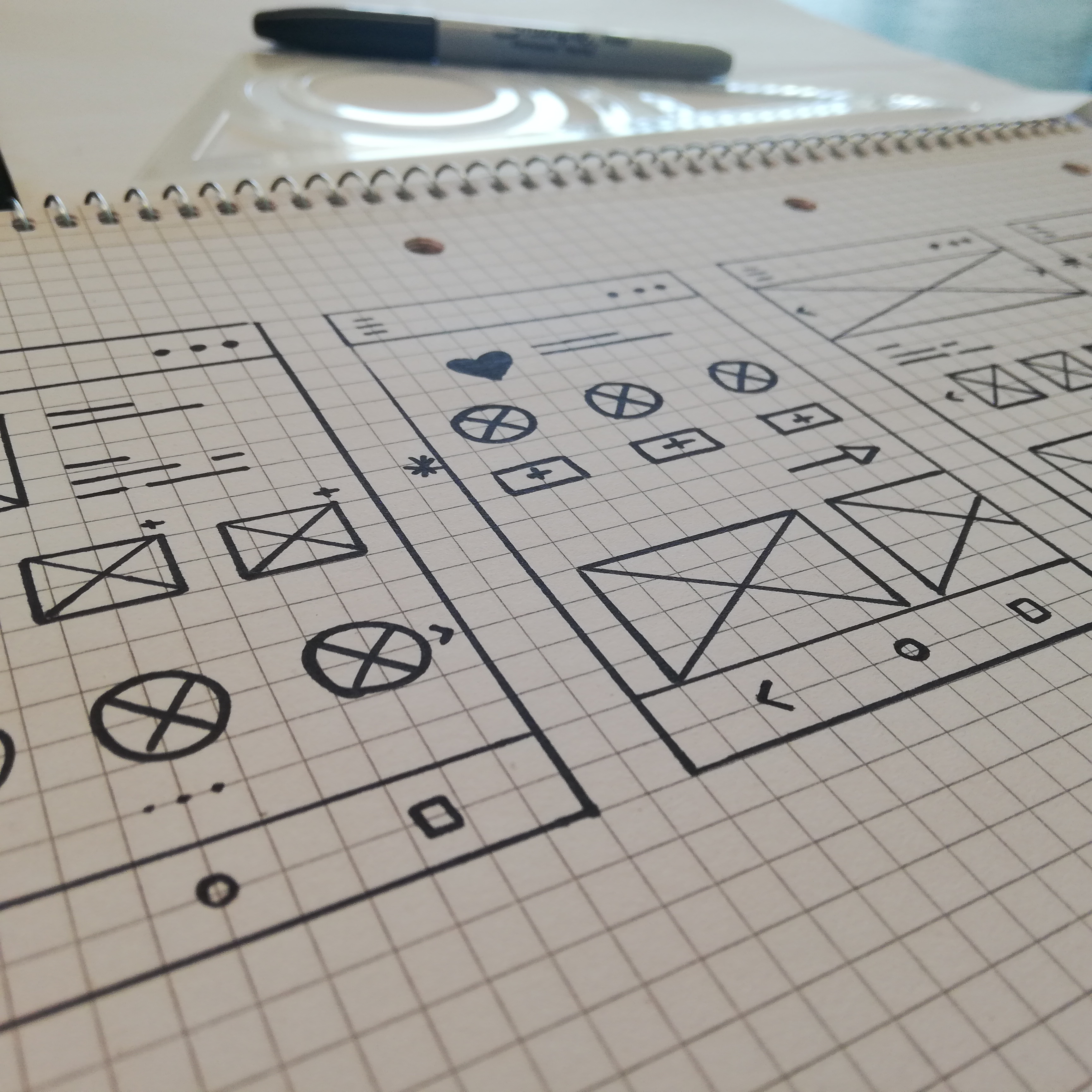 Paper wireframe sketches for BreadBox homepage